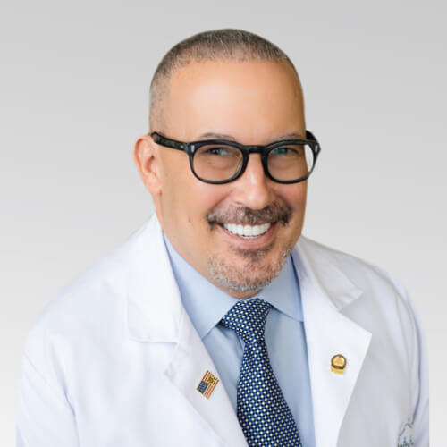 John A. Millard, MD